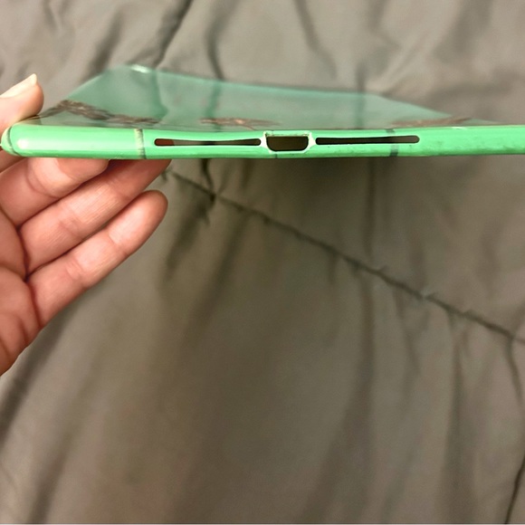 I pad cover green w Palm tree pattern.  Silver text - Picture 2 of 4